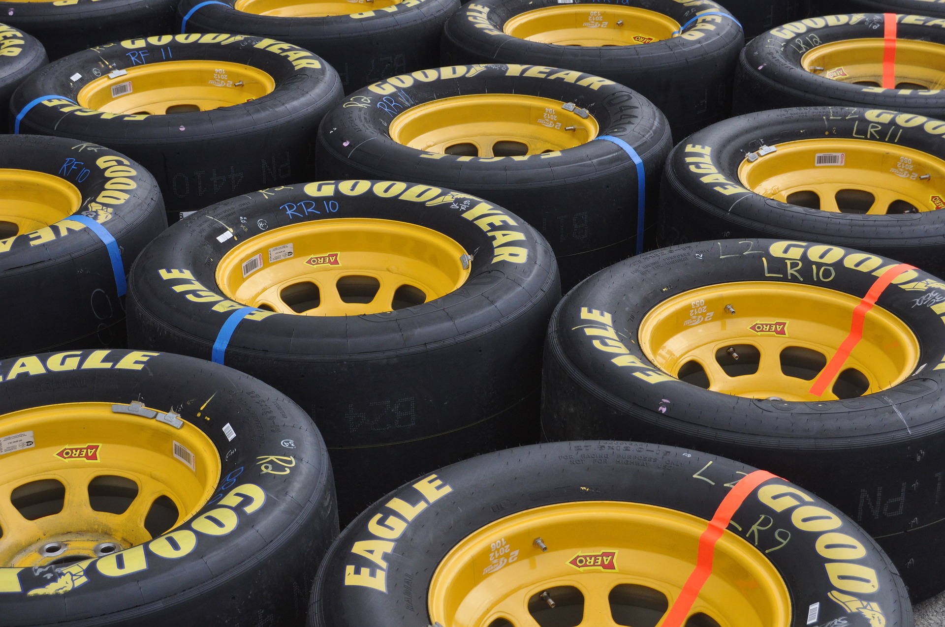 How much does a NASCAR race tire weigh?