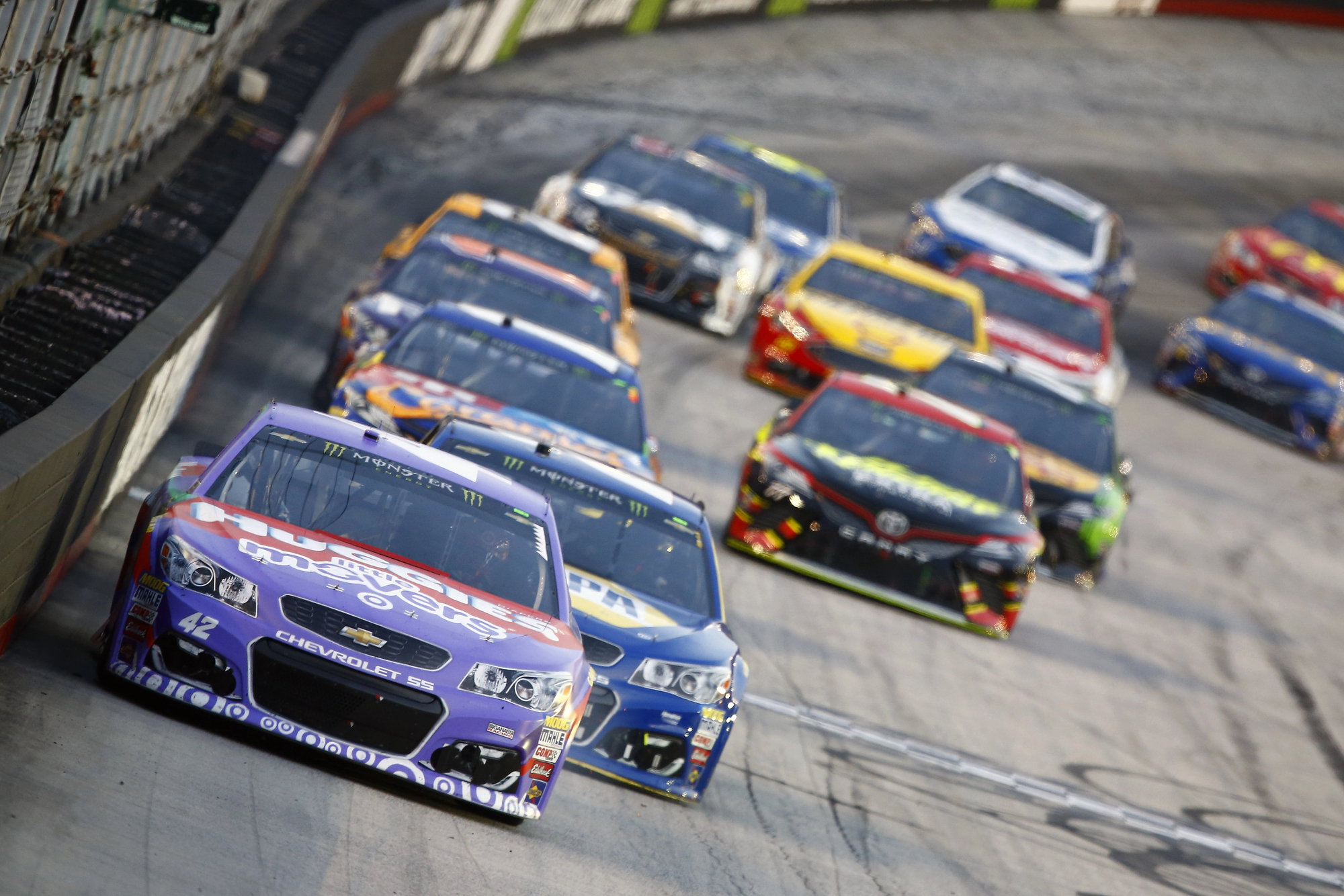 Kyle Larson (42) brings his race car down the front stretch during the Bass Pro Shops NRA Night Race at Bristol Motor Speedway in Bristol, Tennessee. (Photo by actionsports/Deposit Photos)