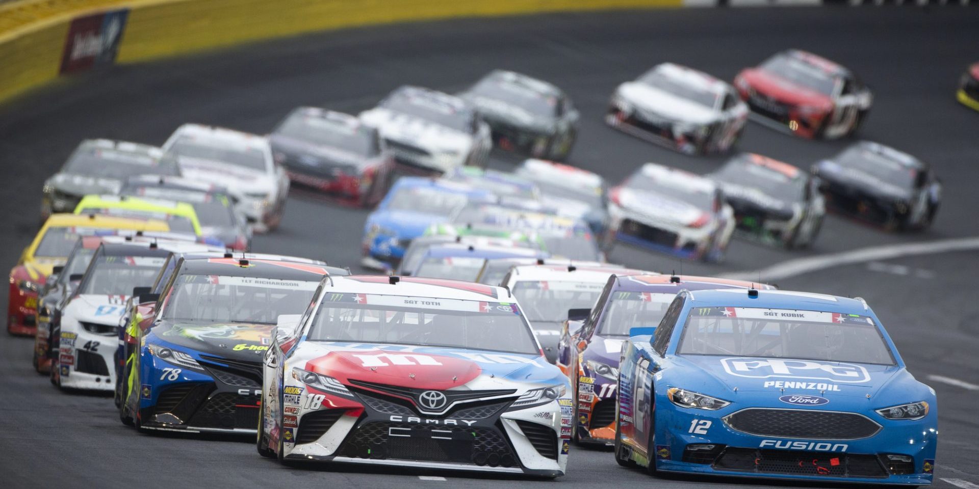 Kyle Busch (18) races down the front stretch during the Coca-Cola 600 at Charlotte Motor Speedway in Concord, North Carolina (Photo by actionsports/Deposit Photo)