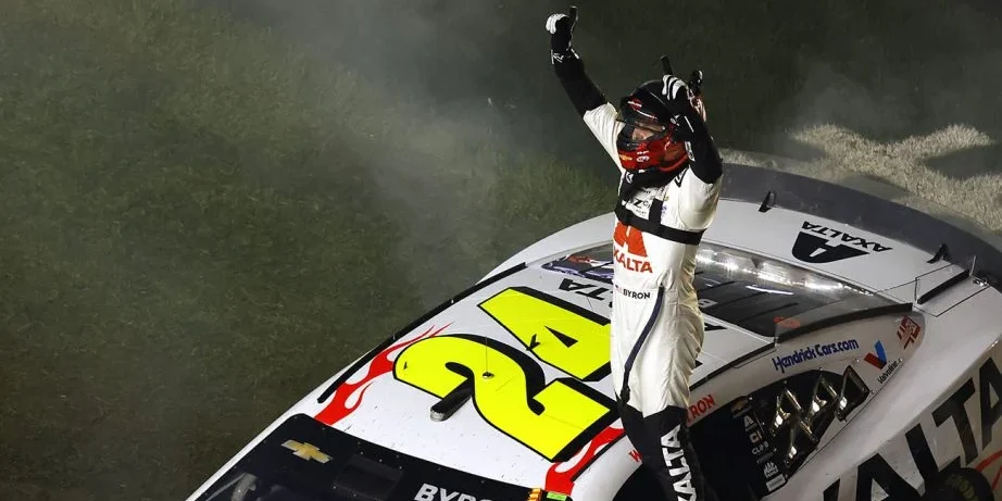 William Byron, driver of the No. 24 Axalta Chevrolet, celebrates after winning the NASCAR Cup Series Daytona 500 at Daytona International Speedway.