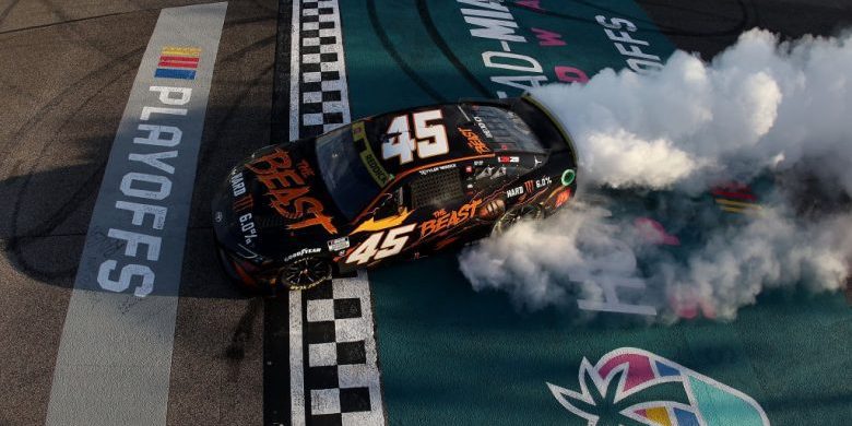 Tyler Reddick, driver of the No. 45 The Beast Killer Sunrise Toyota, celebrates with a burnout after winning the NASCAR Cup Series Straight Talk Wireless 400 at Homestead-Miami Speedway (image courtesy NASCAR)